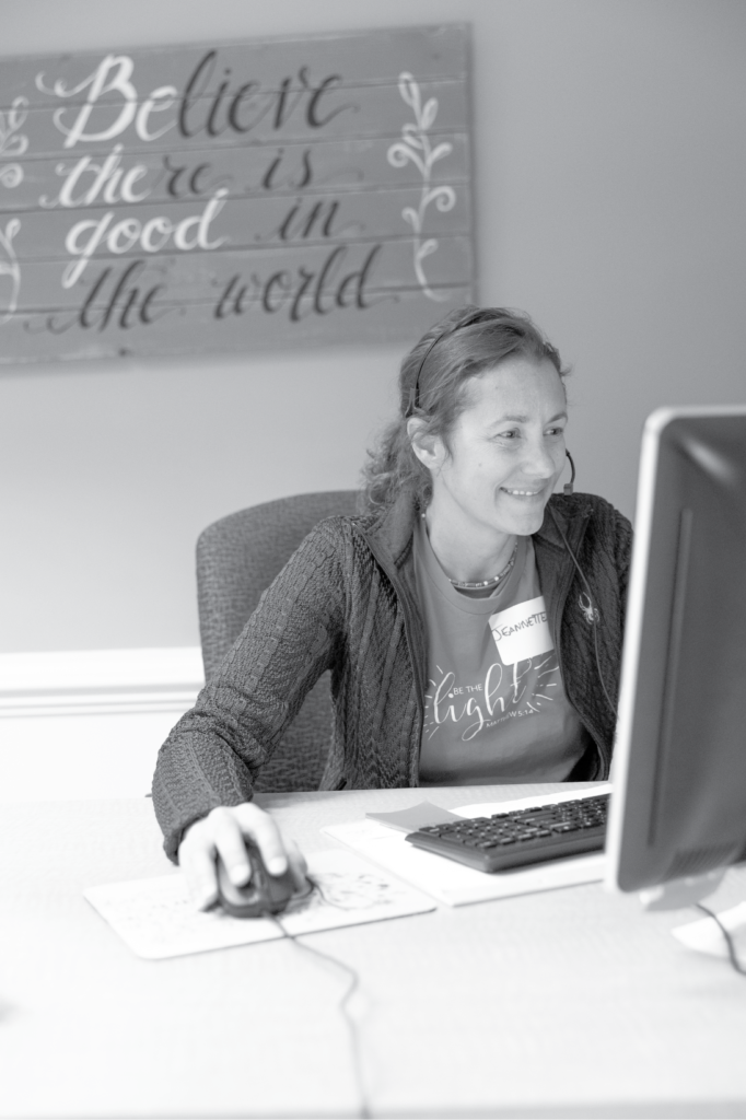 Jeannette-at-front-deskbw